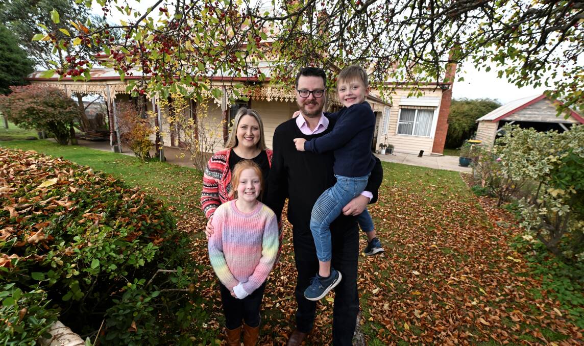 Meaghan, eight-year-old Delilah, Daniel and five-year-old Hugo Palm are the new owners of the 122-year-old house. Picture by Lachlan Bence 