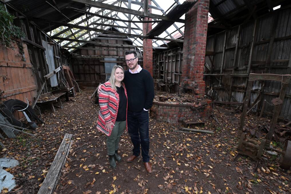 Meaghan and Daniel Palm in the shed of Ascot's original blacksmith. Picture by Lachlan Bence
