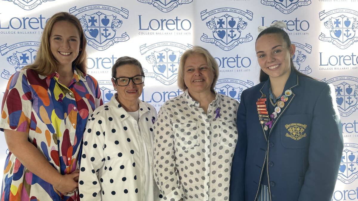 Loreto Women In Time Grace Mulcahy (class of 2016), Louise Leighton (representing sister Margot Serch, 1955) and Andrea Dennett (1981) celebrate with year 11 Loreto student Bethany Ryan, who has been recognised for her community service. Picture by Melanie Whelan