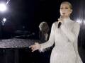 Canadian singer Celine Dion has made a triumphant return to performing - on the Eiffel Tower. Photo: AP PHOTO